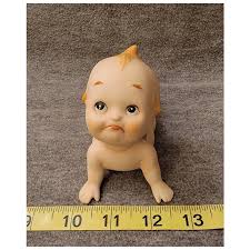 Kewpie figurine. For Sale at Ruby Lane