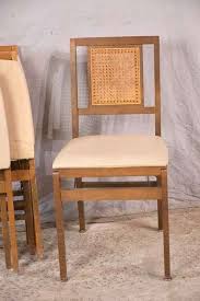 Set of 4 Stakmore folding chairs with cane backs; 192-2495 - R.H. Lee & Co. Auctioneers