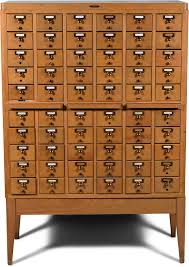 Lot - REMINGTON MID-CENTURY MAPLE CARD CATALOGUE, CIRCA 1950 60 x 41 x 18 1/2 in. (152.4 x 104.1 x 47 cm.)