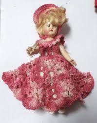 Unidentified Hard Plastic Doll in a Pink Crocheted Dress ...