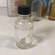 LOT 59L: Vintage Ball and Claw Bitters Wheaton Bottle & Other Vintage Glass Bottles & Jars | EstateSales.org