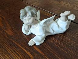 Lladro Porcelain Angel Figurine in Glossy Porcelain Lying Down With Her Legs Crossed in White - Etsy Canada