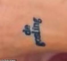 Eva Mendes proudly showcases tattoo which hints she may have ...