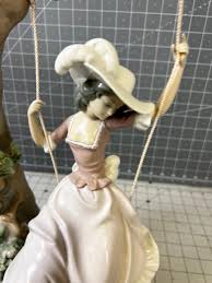 LLADRO Lady in a Swing | EstateSales.org