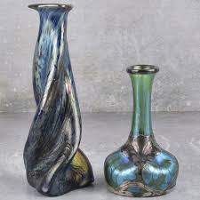 Sold at Auction: Loetz Pewter Mounted Iridescent Glass Vase