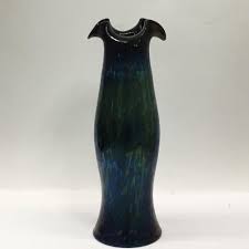 Sold at Auction: Iridescent Art Glass Vase