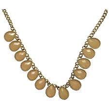 Peach Colored Faceted Teardrops on a Gold-Tone Chain ...
