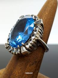 Oval Cut 25 carat Topaz Baguette & Round White Topaz Halo ...