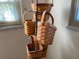 Sold at Auction: HANGING RACK OF LONGABERGER BASKETS