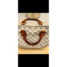 Louis Vuitton Speedy: Iconic Damier Azur Handbag