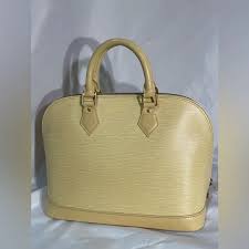 Louis Vuitton | Bags | Louis Vuitton Epi Alma Pm Vanilla ...