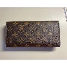 Louis Vuitton Wallet: Iconic Trunk Design
