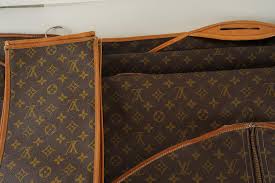 Lot - FOUR LOUIS VUITTON TRAVEL PIECES