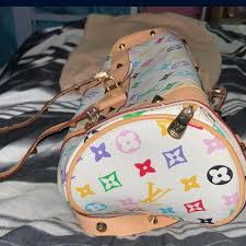 This is a Louis Vuitton purse, multi color, no... | Depop