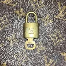 Louis Vuitton | Accessories | Authentic Lv Lock Key 32 ...