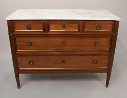 Lot - LOUIS XVI STYLE MARBLE TOP COMMODE; height: 33 1/4 inches; width: 44 1/2 inches; depth: 18 1/4 inches