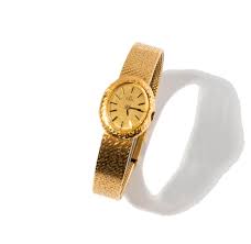 Lot - Ebel 18 Karat Yellow Gold Watch