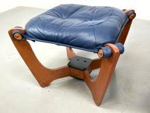 Sold at Auction: ODD KNUTSEN "LUNA" LEATHER HIGH BACK SLING LOUNGE CHAIR AND OTTOMAN.