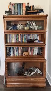 I was admittedly initially hesitant to put my antique barrister bookcase in my son's room but now I can't imagine it anywhere else.