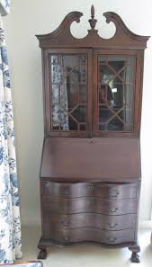 Sold at Auction: Mahogany Serpentine Front Secretary Desk