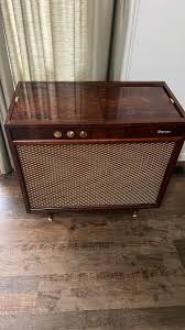 Vintage Console Stereo with Phonograph and Radio
