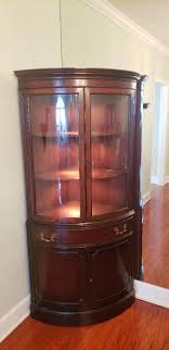 1940s Curved Glass Demilune Form Mahogany Corner China Cabinet from the White Fine Furniture Company, 6 H | EstateSales.org