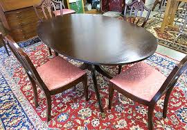 Lot - OVAL MAHOGANY DINING TABLE AND SIX CHAIRS, American ...
