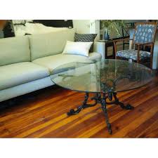 Glass and Wrought Iron Coffee Table - AptDeco
