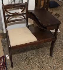 Lot - Mahogany telephone table, made by Lammerts Furniture Co