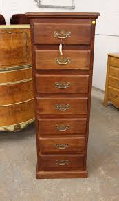 Sold at Auction: Vintage pine 7 drawer lingerie chest, structurally sound and top has finish issues (see photos), 57"h x 20"w x 18"d