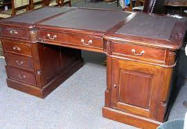 Sold at Auction: HAND CARVED MAHOGANY AND LEATHER TOP ...
