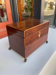 English inlaid tea caddy with brass paw feet For Sale at 1stDibs