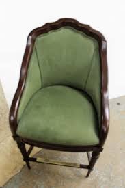 Sold at Auction: Quality pair swivel barreled bar stools, like new good condition, upholstered, mahogany finish framed with brass foot rests, barreled back, scallop tops,