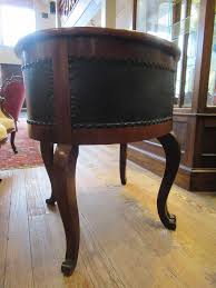 Lot - Carved Mahogany Convertible Desk and Chair