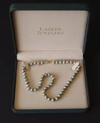 Sold at Auction: BLACK BAROQUE PEARL NECKLACE