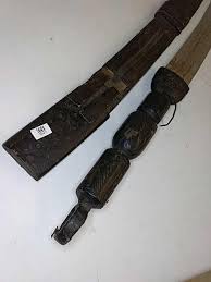 Sold at Auction: Antique Leather Handled Sword w Hidden Push ...