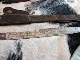 Can someone help me out and tell me what kind of sword this ...
