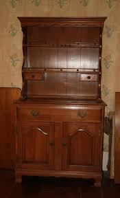 Sold at Auction: 1960s Colonial Maple Dining Set with Hutch