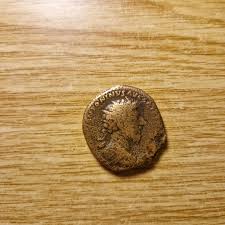 I know this is a coin from Marcus Aurelius era, but i can't ...