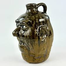 Lot - Lanier Meaders Tobacco Spit-Face Jug