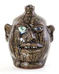 Lot - Lanier Meaders running eye stoneware face jug