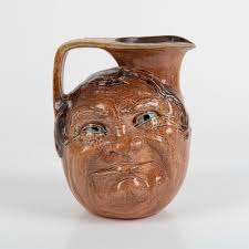Sold at Auction: Martin Brothers Stoneware Double Face Jug