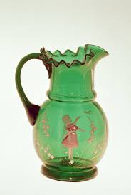 Mary Gregory green jug with fired enamel painting of child, possibly Bohemian, late 19th century