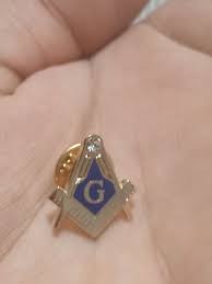 Pin Escuadra y compas