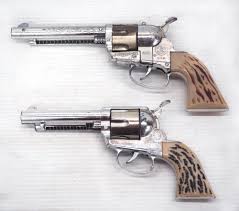 Sold at Auction: (2) Mattel Cast Iron Cap Guns