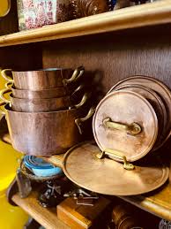 Antique copper pan set – De wereld van Kant