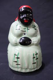 Sold at Auction: McCoy Aunt Jemima String Holder & Chalk Heads