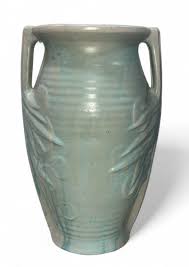 Sold at Auction: Two Vintage MCCOY Pottery Sand Dollar Vases