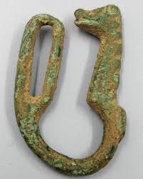 Sold at Auction: A Medieval Iron Zoomorphic Sword or Dagger Hanger. 5.5cm.