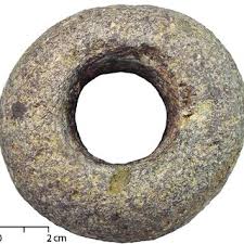 Stone club head. The specimen (212) has a weight of 655 ...